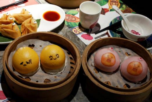 ?正宗蛋黃流沙包的做法是什么?流沙包奶黃包哪個好吃?