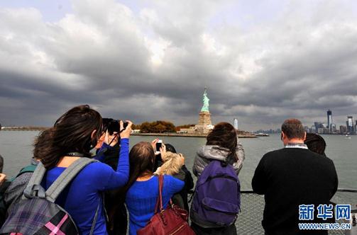 颶風桑迪重創美國，自由女神像被淹照網絡瘋傳，實為網友PS素材電影天后