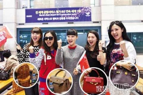 恒大土豪太太團出戰韓國:滿身名牌